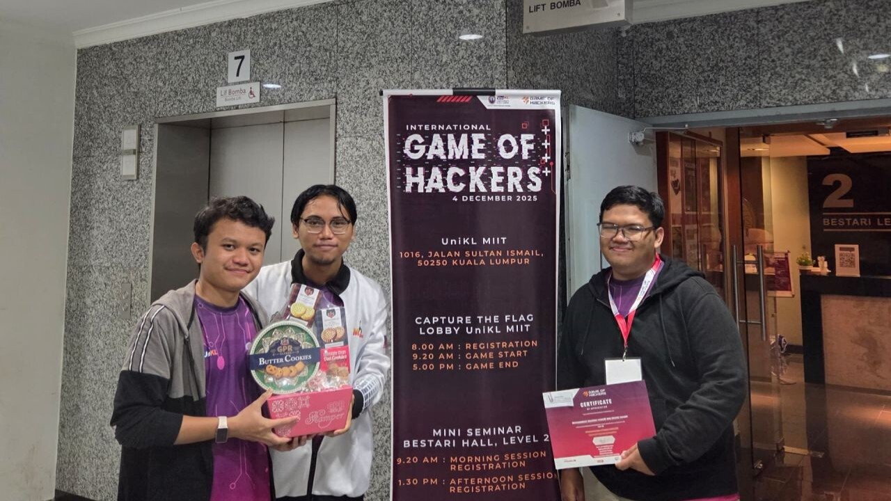 Muhaimin and Afiq Danial holding our hampers and me holding our certificates at IGOH 2025