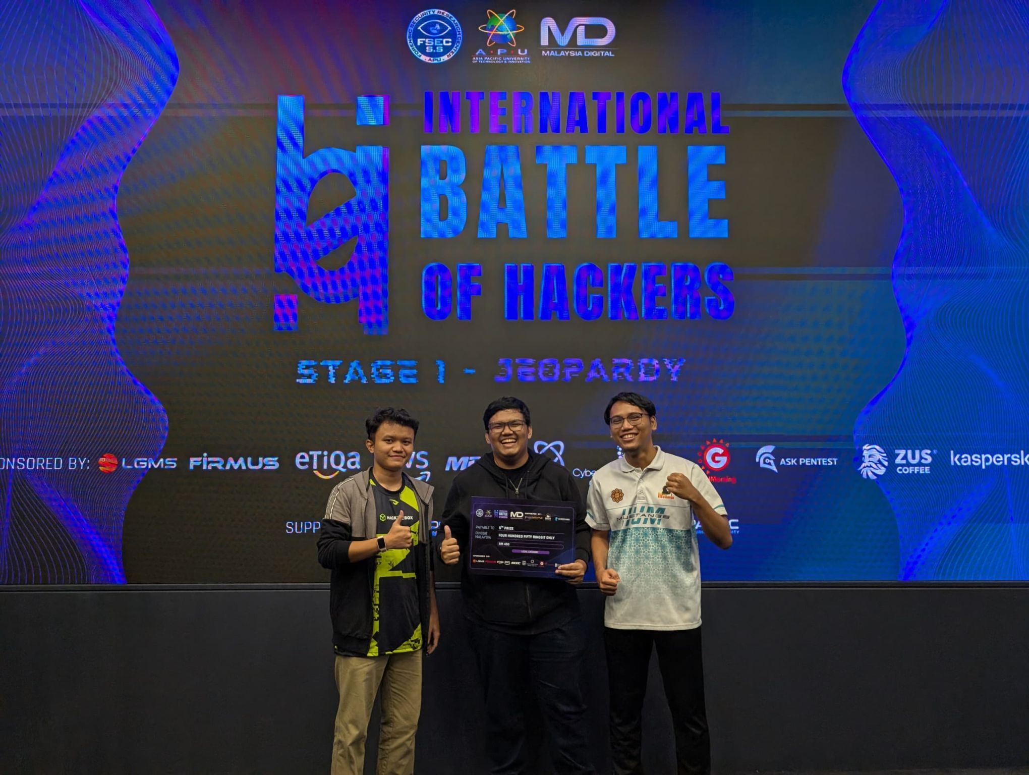 Muhaimin, Me and Afiq Danial holding our 5th place cheque at IBOH CTF 2025 - Stage 1
