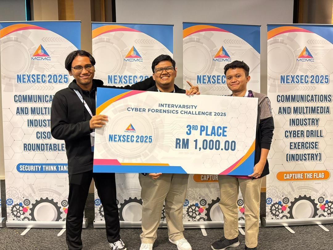 Afiq Danial, Me and Muhaimin holding our 3th place cheque at NexSec 2025